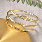 RACHEL GALLEY Yellow Gold Overlay Sterling Silver Bangle (Size 7), Silver wt. 40.67 Gms