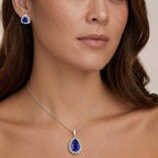 Managing Director Special Rhapsody 11.3 ct. AAAA Tanzanite & Natural Diamond (VS/EF) Solitaire Halo Pendant in 950 Platinum