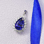 Managing Director Special Rhapsody 11.3 ct. AAAA Tanzanite & Natural Diamond (VS/EF) Solitaire Halo Pendant in 950 Platinum