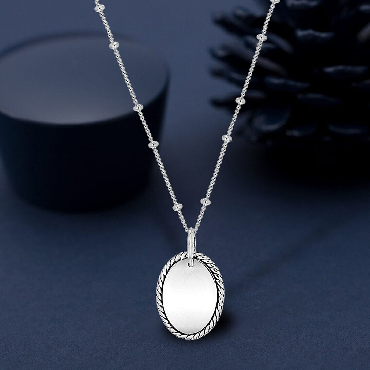 Sterling Silver Rhodium Plated 13.6mm x 22.3mm Twist-Edge Oval Pendant Ball Chain Adjustable Necklace 16 Inch to 18 Inch 7456973 1