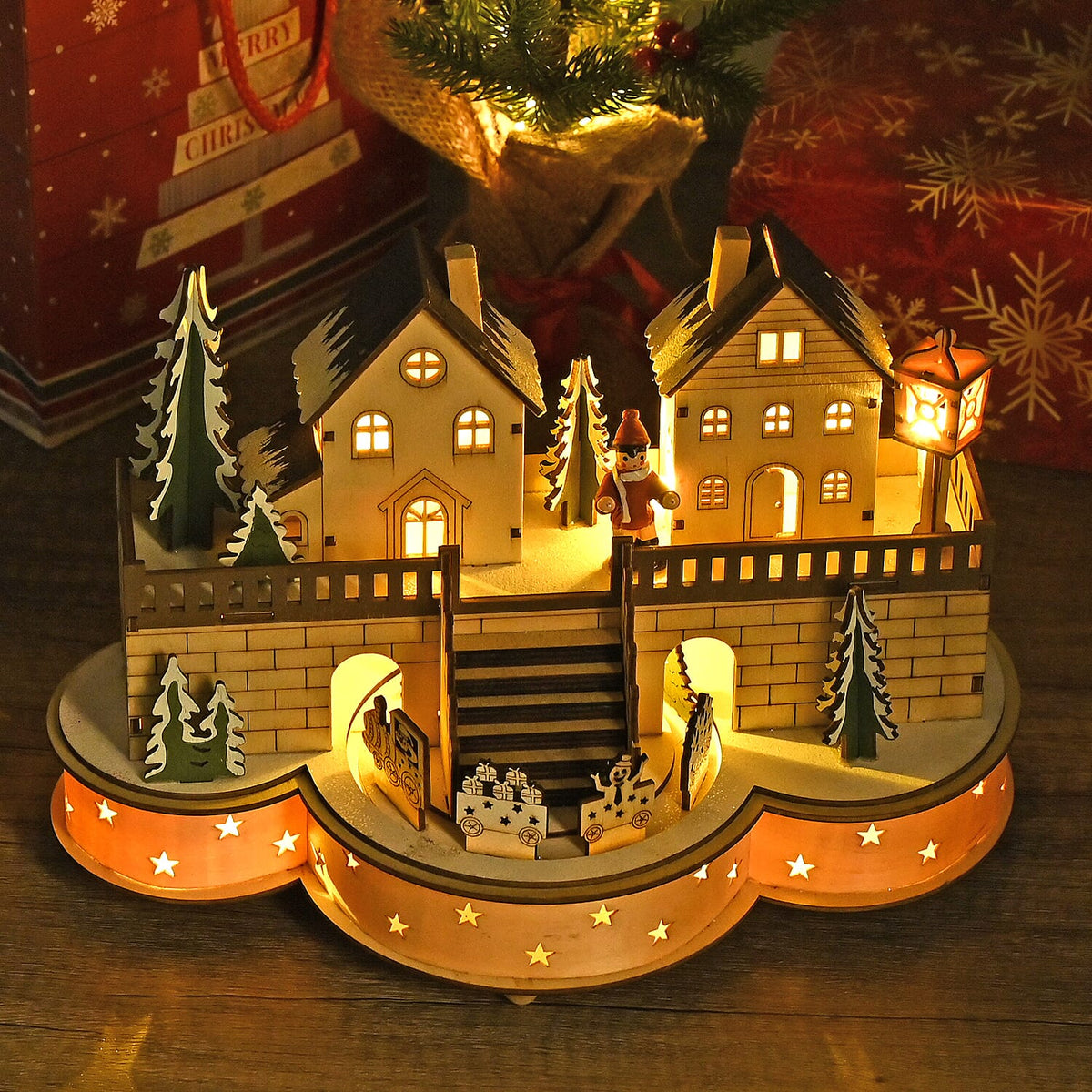 Rotating Plywood House with Music and 7 Warm LED Lights (Size-30x21x14cm) Requires 2xAA (Battery Not Inc.) 7595464 1