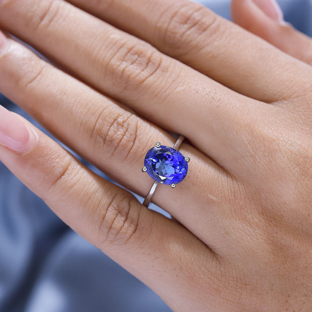 RHAPSODY 950 Platinum AAAA Tanzanite Solitaire Ring 4.13 Ct
