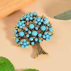 Designer Inspired - Austrian Blue Crystal Tree Brooch in Antique Gold Tone