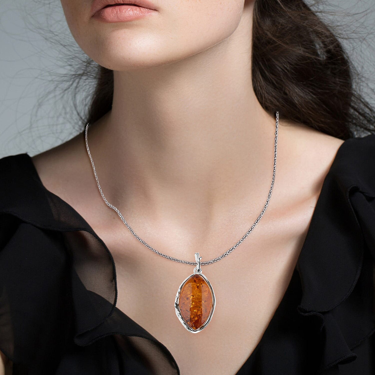 Tucson Find - Amber Solitaire Pendant in Sterling Silver 17.00 Ct. 8219687 1