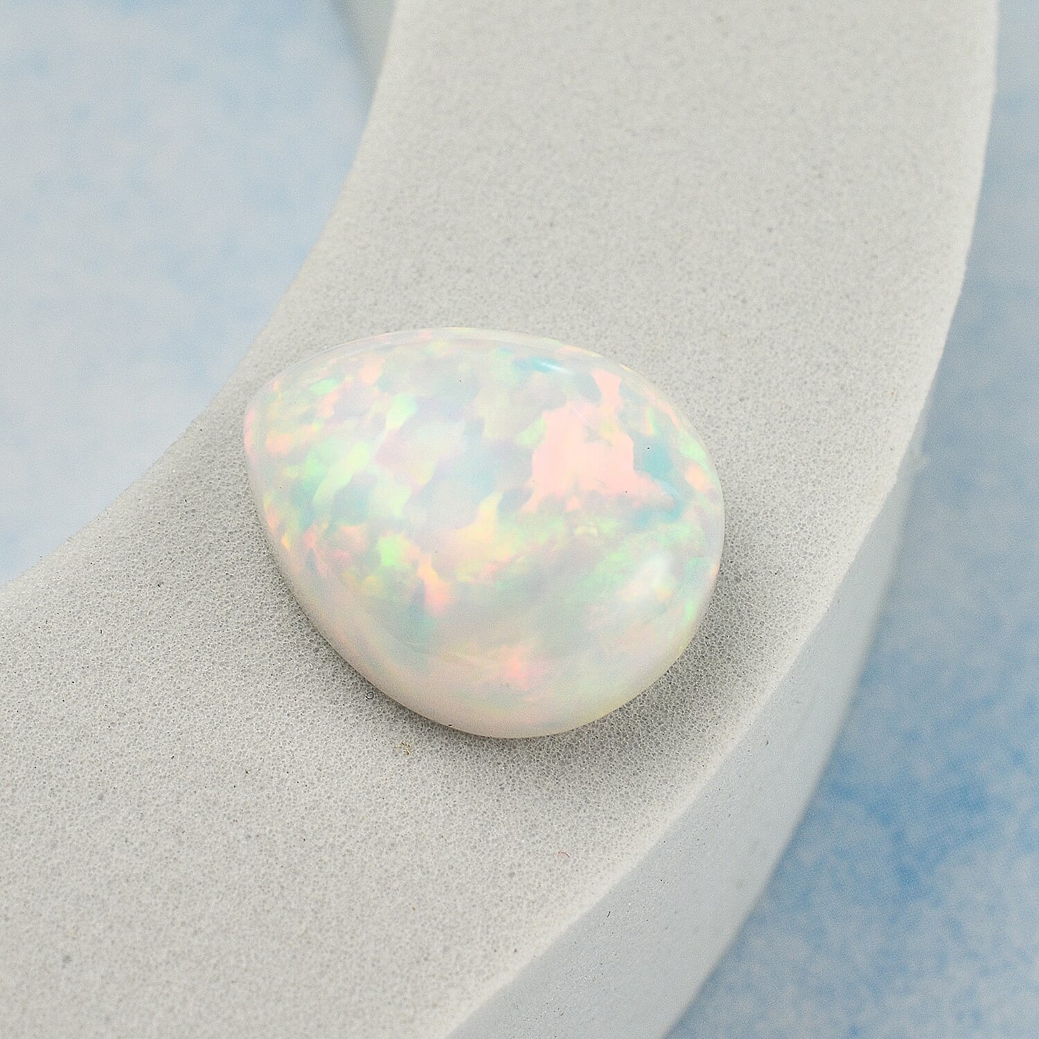 Tucson Rare Find - 10 Ct. AAAA Ethiopian Opal Loose Gemstone in Pear Shape 7716038 1