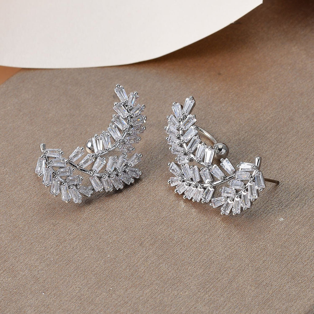 NY Close Out- Cubic Zirconia Leaf Dangle Earrings in Silver Tone