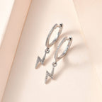 Diamond Dangle Earrings in Platinum Overlay Sterling Silver 0.20 Ct