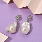 White Baroque Pearl Earrings with Push Back in Rhodium Overlay Sterling Silver 63.31 Ct.