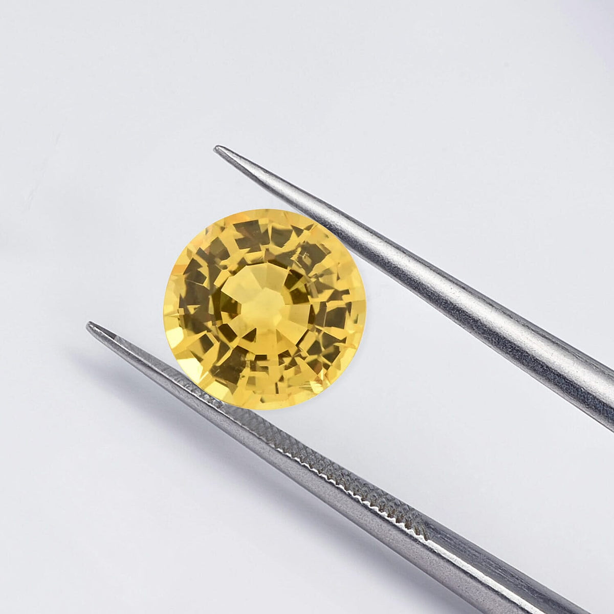 Certified &amp; Appraised 1 Ct. AAAA Yellow Sapphire Loose Gemstone in Round Shape (6 MM) 3839129 2