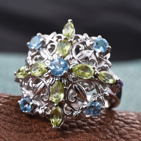 Stefy Electric Swiss Blue Topaz (Rnd), Hebei Peridot, Tanzanite and Pink Sapphire Ring in Platinum Overlay Sterling Silver 2.500 Ct.