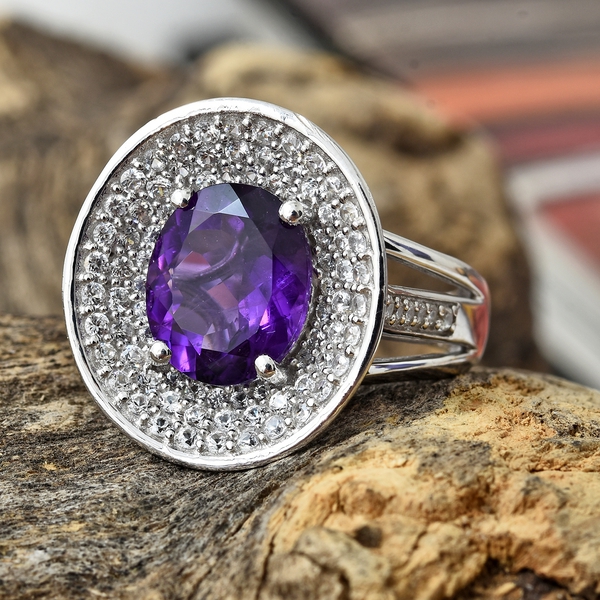 Lusaka Amethyst (Ovl 4.15 Ct), Natural Cambodian Zircon Ring in Platinum Overlay Sterling Silver 5.750 Ct. Silver wt 6.80 Gms.