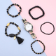 6 Piece Set - STRADA Japanese Movement White Dial Water Resistant Watch with Floral Pattern Strap and Five Black Beads Stretchable Bracelet (Size 6.5-7)