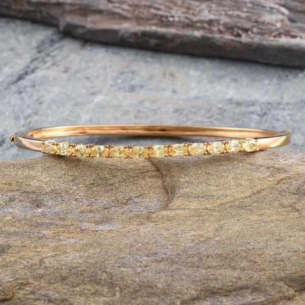 Simulated Citrine (Ovl) Bangle (Size 7.5) in ION Plated 18K Yellow Gold Bond 3.500 Ct