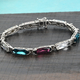 Lustro Stella Foilback Amethyst, Indicolite Crystal and White Colour Crystal Bracelet (Size 7.5) in Silver Tone
