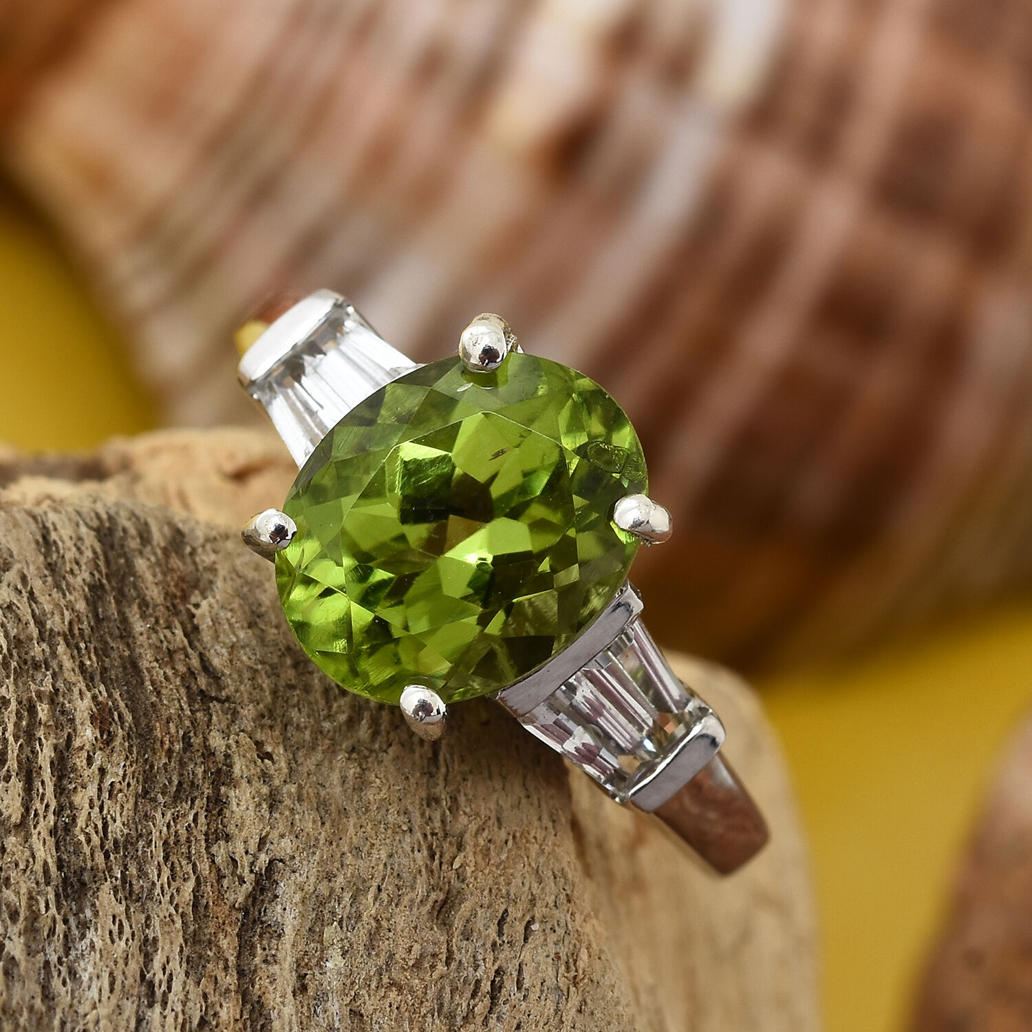 Rare Size Hebei Peridot (Ovl 2.40 Ct), White Topaz Ring in Platinum Overlay Sterling Silver 2.750 Ct.