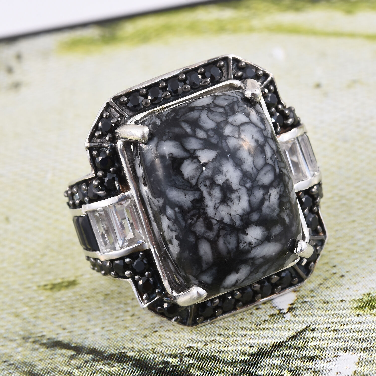 Austrian Pinolith (Oct 20.40 Ct), Boi Ploi Black Spinel and White Topaz Ring in Platinum Overlay Sterling Silver 24.500 Ct.