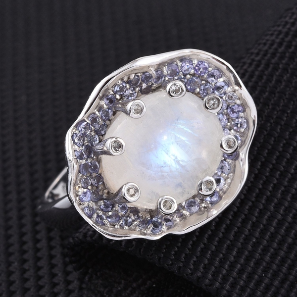 GP Rainbow Moonstone (Ovl 9.25 Ct), Kanchanaburi Blue Sapphire, Tanzanite and White Topaz Ring in Platinum Overlay Sterling Silver 10.250 Ct.