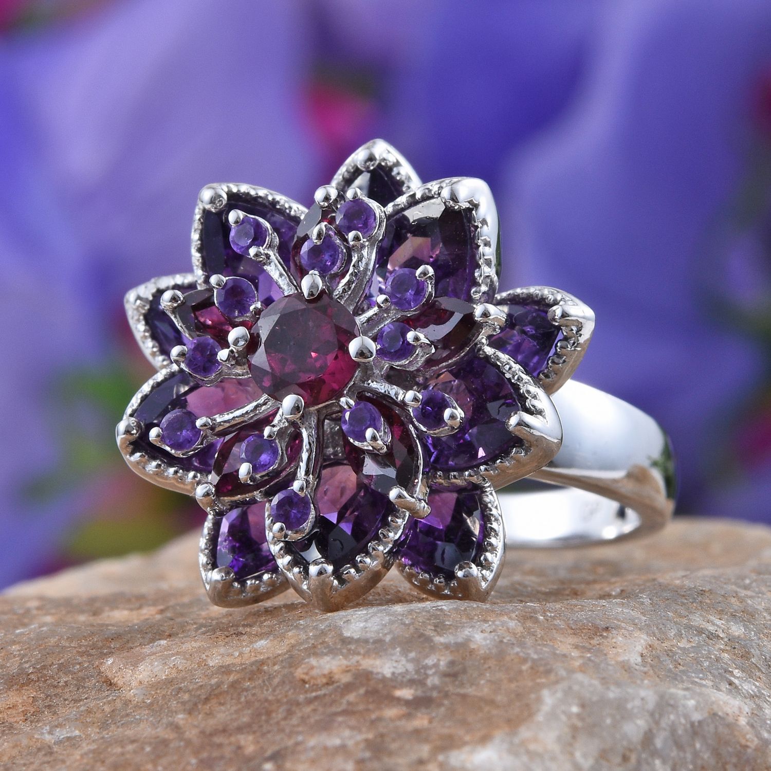 GP Rhodolite Garnet (Rnd 0.75 Ct), Amethyst and Kanchanaburi Blue Sapphire Floral Ring in Platinum Overlay Sterling Silver 7.500 Ct.