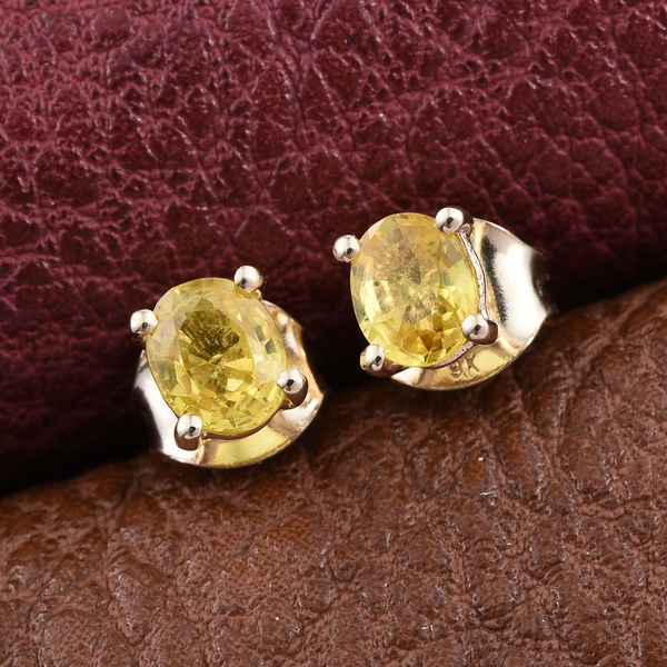 9K Yellow Gold 1 Carat Yellow Sapphire Oval Solitaire Stud Earrings.