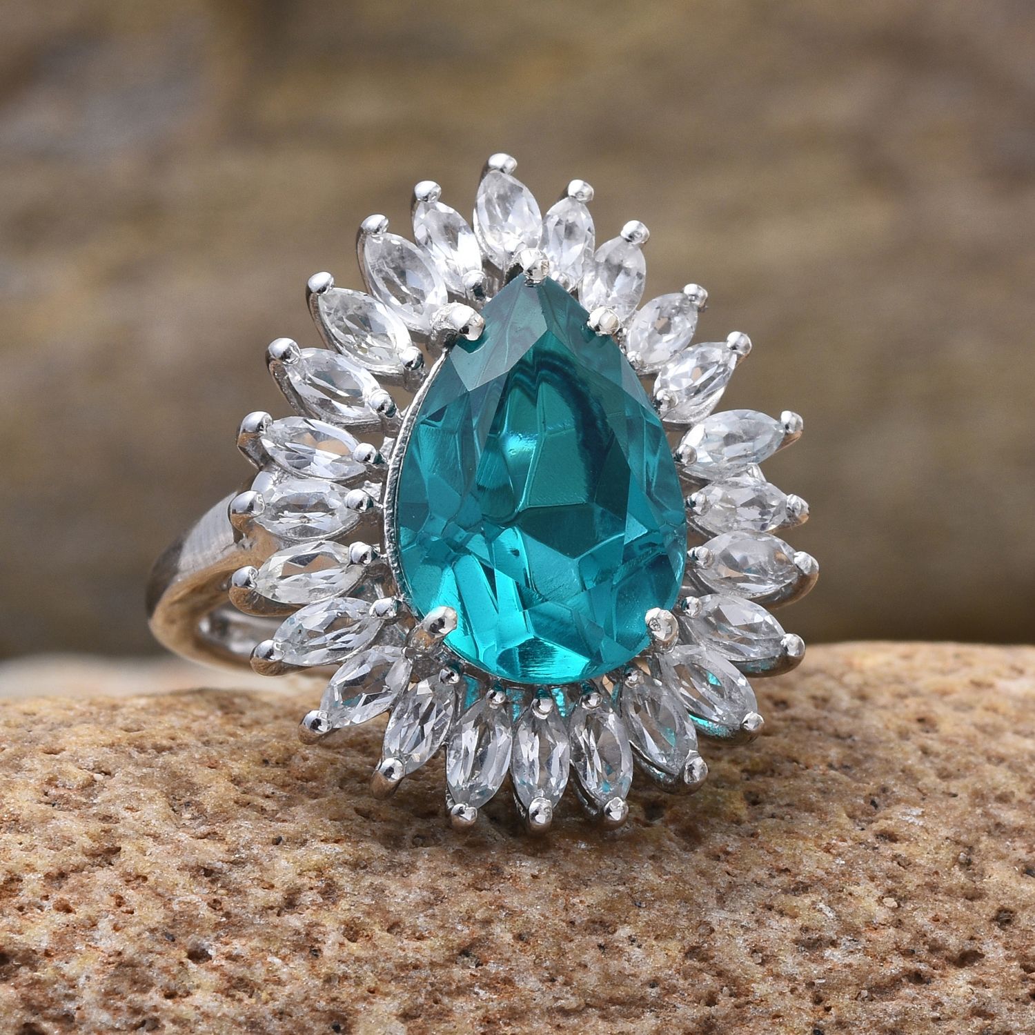 Capri Blue Quartz (Pear 6.00 Ct), White Topaz Ring in Platinum Overlay Sterling Silver 8.400 Ct.