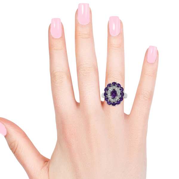 Lusaka Amethyst (Ovl), Natural White Cambodian Zircon Ring in Rhodium Plated Sterling Silver 2.280 Ct. Silver wt 6.74 Gms.