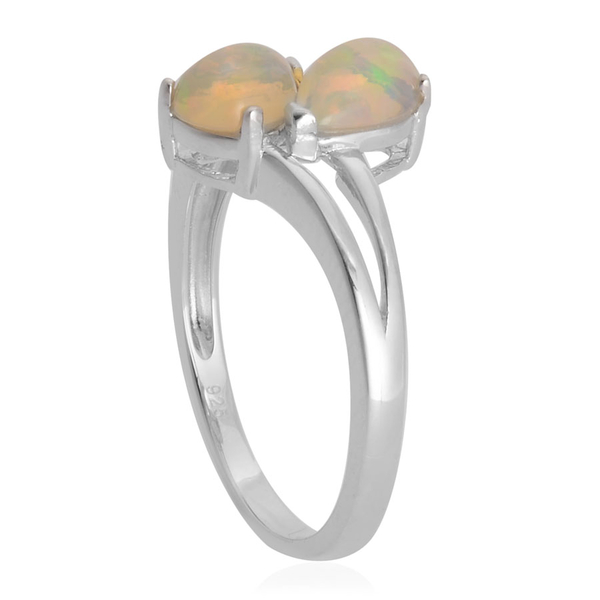 Ethiopian Welo Opal (Pear) Crossover Ring in Rhodium Plated Sterling Silver 0.900 Ct.