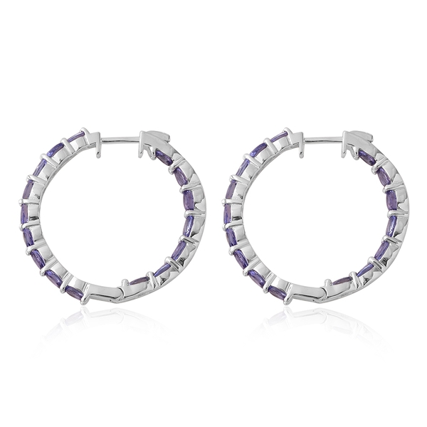 Tanzanite (Ovl) Hoop Earrings (with Clasp) in Rhodium Plated Sterling Silver 5.250 Ct, Silver wt. 5.26 Gms