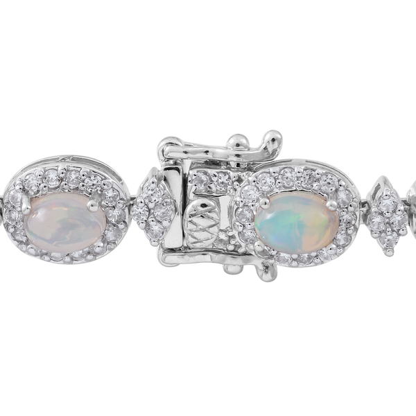 Ethiopian Welo Opal (Ovl), Natural White Cambodian Zircon Bracelet (Size 7.5) in Rhodium Plated Sterling Silver 11.250 Ct. Silver wt 18.00 Gms. Number of Gemstones 251