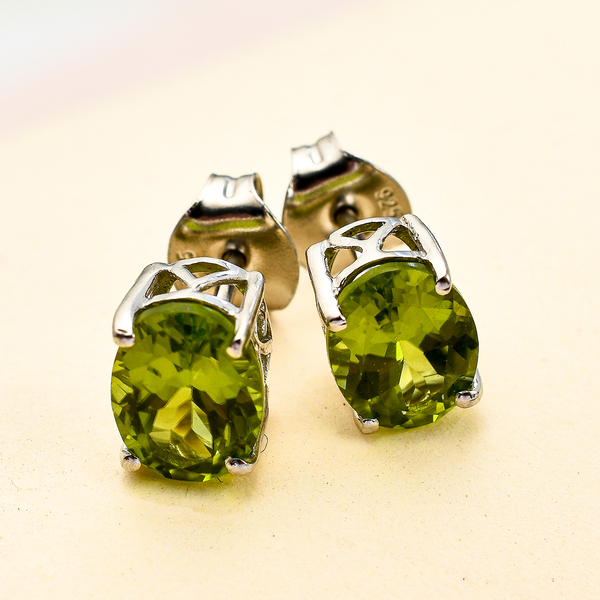 Natural Hebei Peridot (Ovl) Lever Back Earrings in Platinum Overlay Sterling Silver 2.69 Ct.